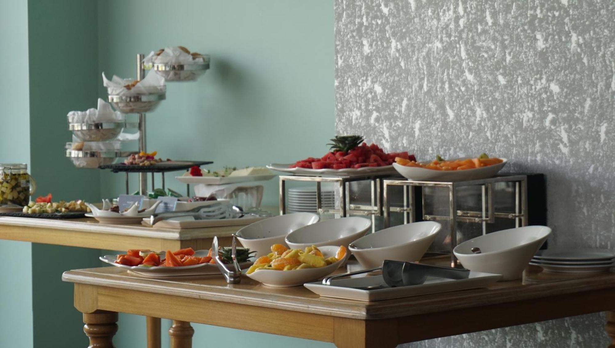 Quo Quality Hotel Manizales Extérieur photo A buffet