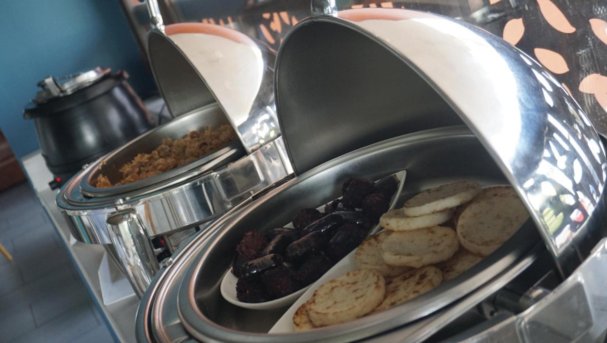 Quo Quality Hotel Manizales Extérieur photo A chafing dish